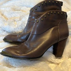 Brown leather ankle bootie.